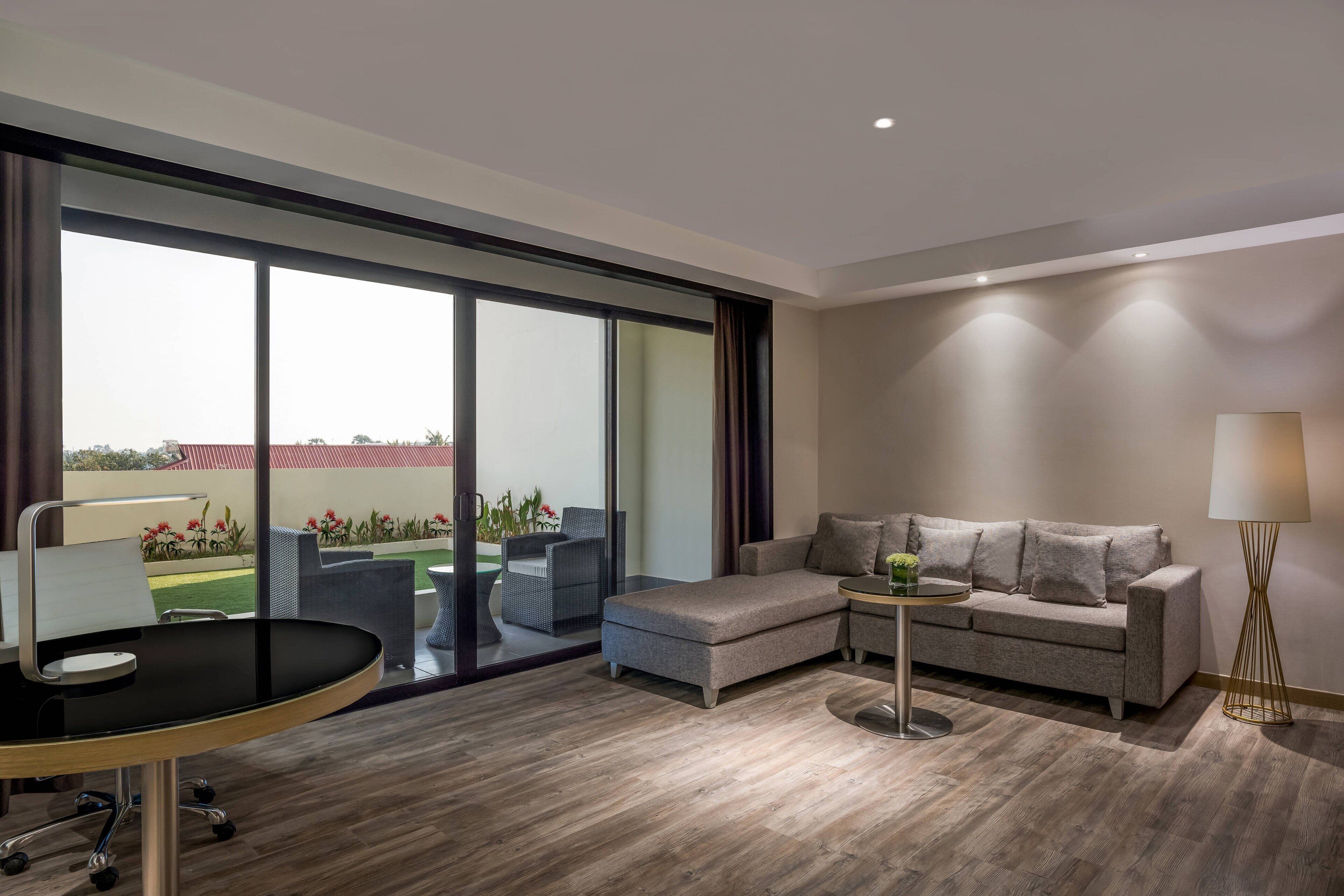 Executive Room, 1 King Bed, Balcony | Living area | 43-inch LED TV with cable channels, TV, iPod dock