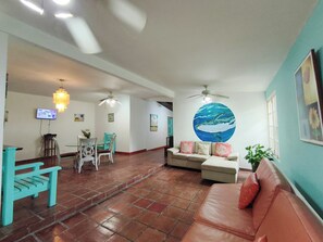 Deluxe Villa, Private Bathroom, Garden View | Living area | 32-inch LED TV with cable channels, TV