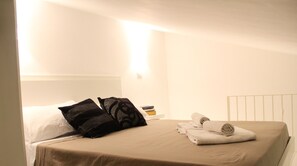 1 bedroom, desk, iron/ironing board, travel cot