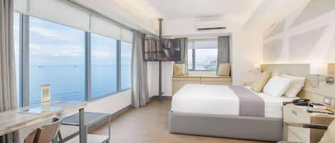 Suite, 1 King Bed, Non Smoking (Sunset Suite) | In-room safe, desk, free WiFi, bed sheets