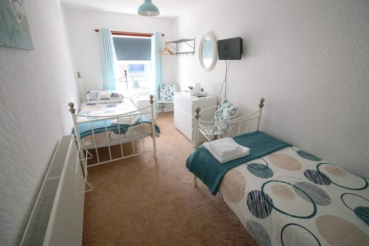 Blackout curtains, iron/ironing board, free cots/infant beds, free WiFi