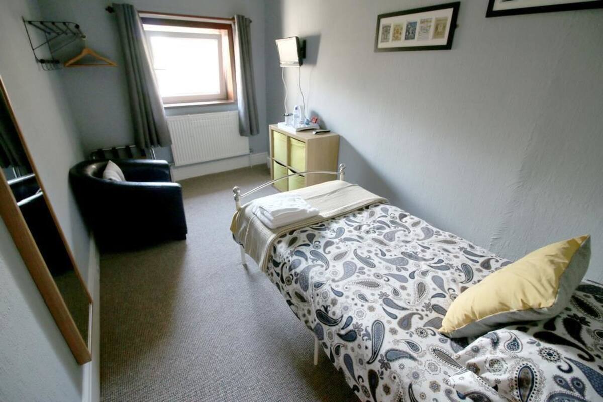 Blackout curtains, iron/ironing board (on request)