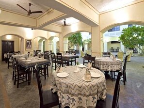 Deluxe Room | Restaurant | Breakfast, lunch, dinner served; international cuisine 