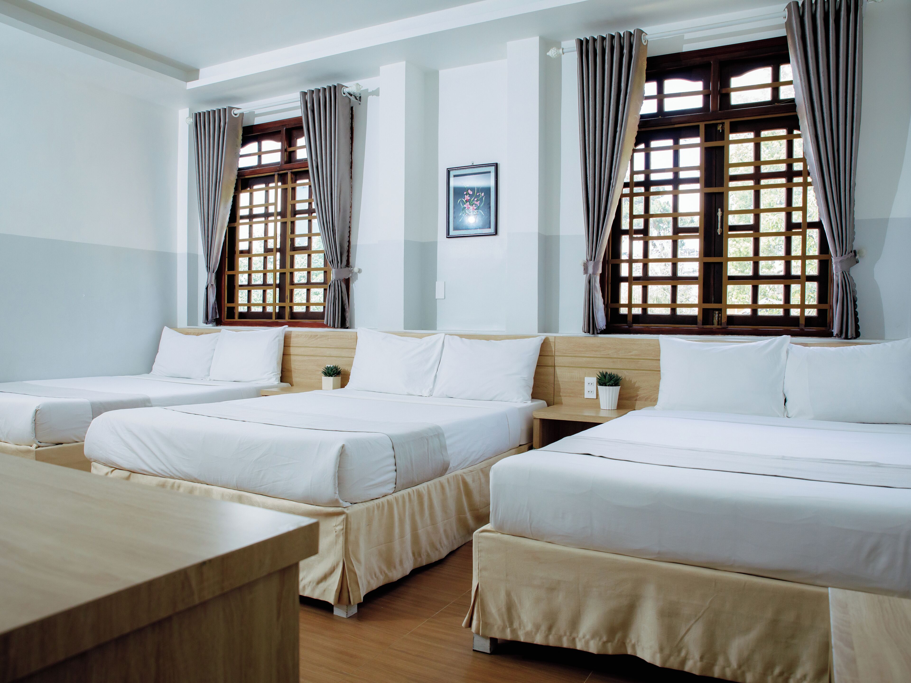 Family Room, Multiple Beds | Minibar, desk, soundproofing, free WiFi