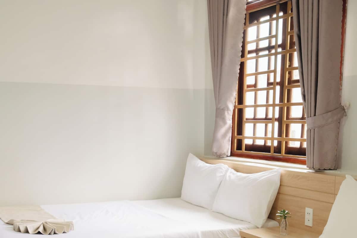 Familierom, flere senger | Minibar, skrivebord, lydisolert og wi-fi (inkludert)