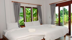 A double bed with white linens, a wooden frame, and grey curtains. - Pran Kiang Lay (Pranburi)