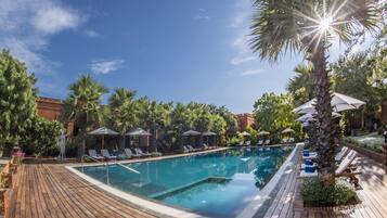 Outdoor pool, pool umbrellas, pool loungers
