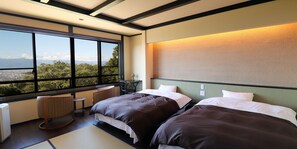 デラックス ダブルまたはツインルーム 専用バスルーム | セーフティボックス (室内)、ベッドシーツ