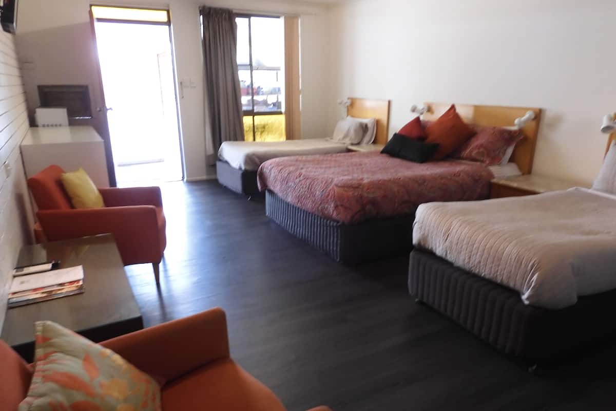 Queen + 2 Singles Room | Desk, laptop workspace, soundproofing, free WiFi
