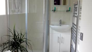 Shower, free toiletries, hair dryer, towels