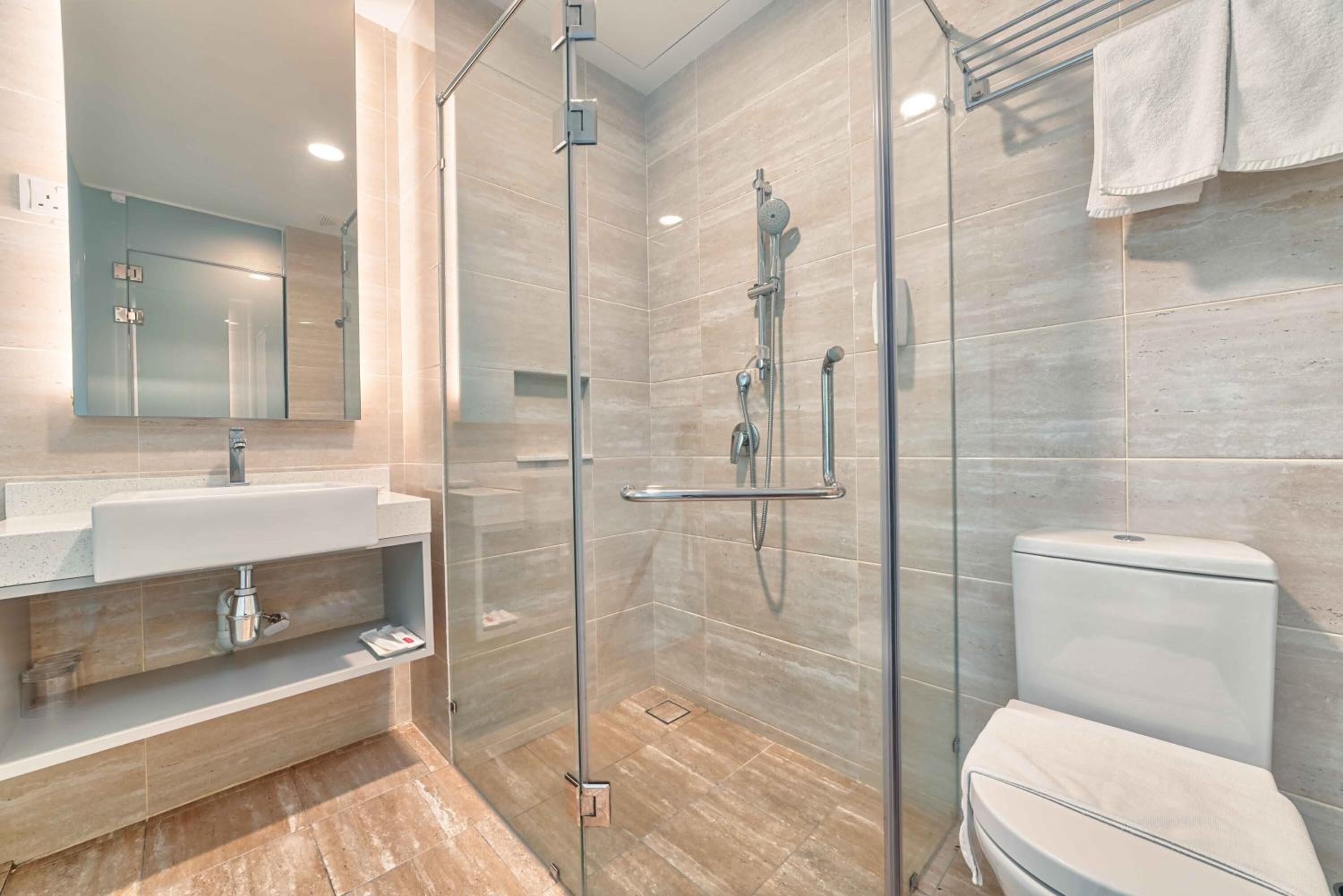 shower, free toiletries, hair dryer, towels