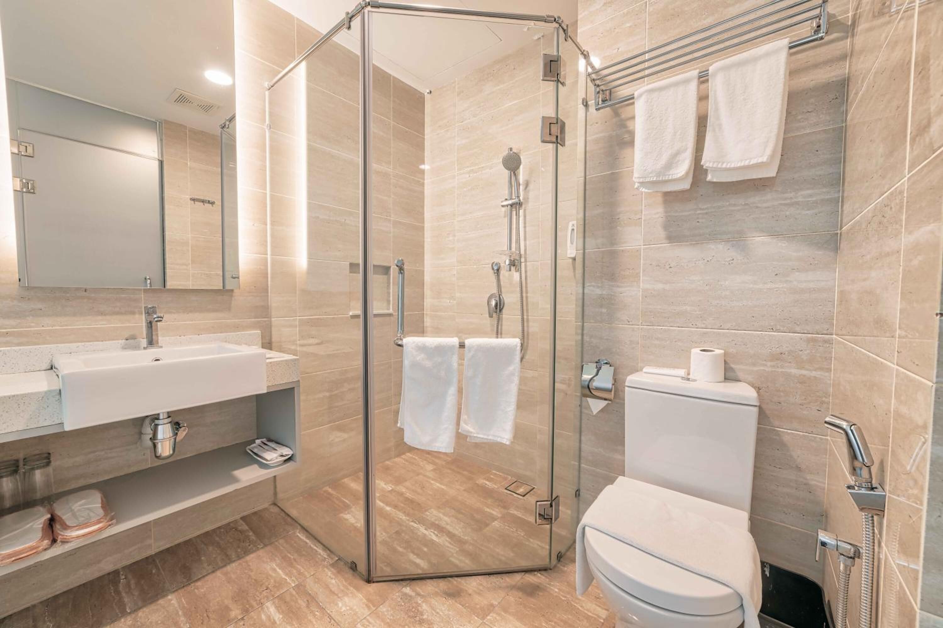 shower, free toiletries, hair dryer, towels