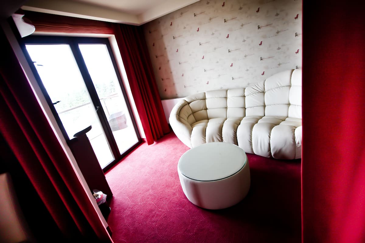 apartment (jacuzzi) | living room | 42-inch flat-screen tv with satellite channels, tv