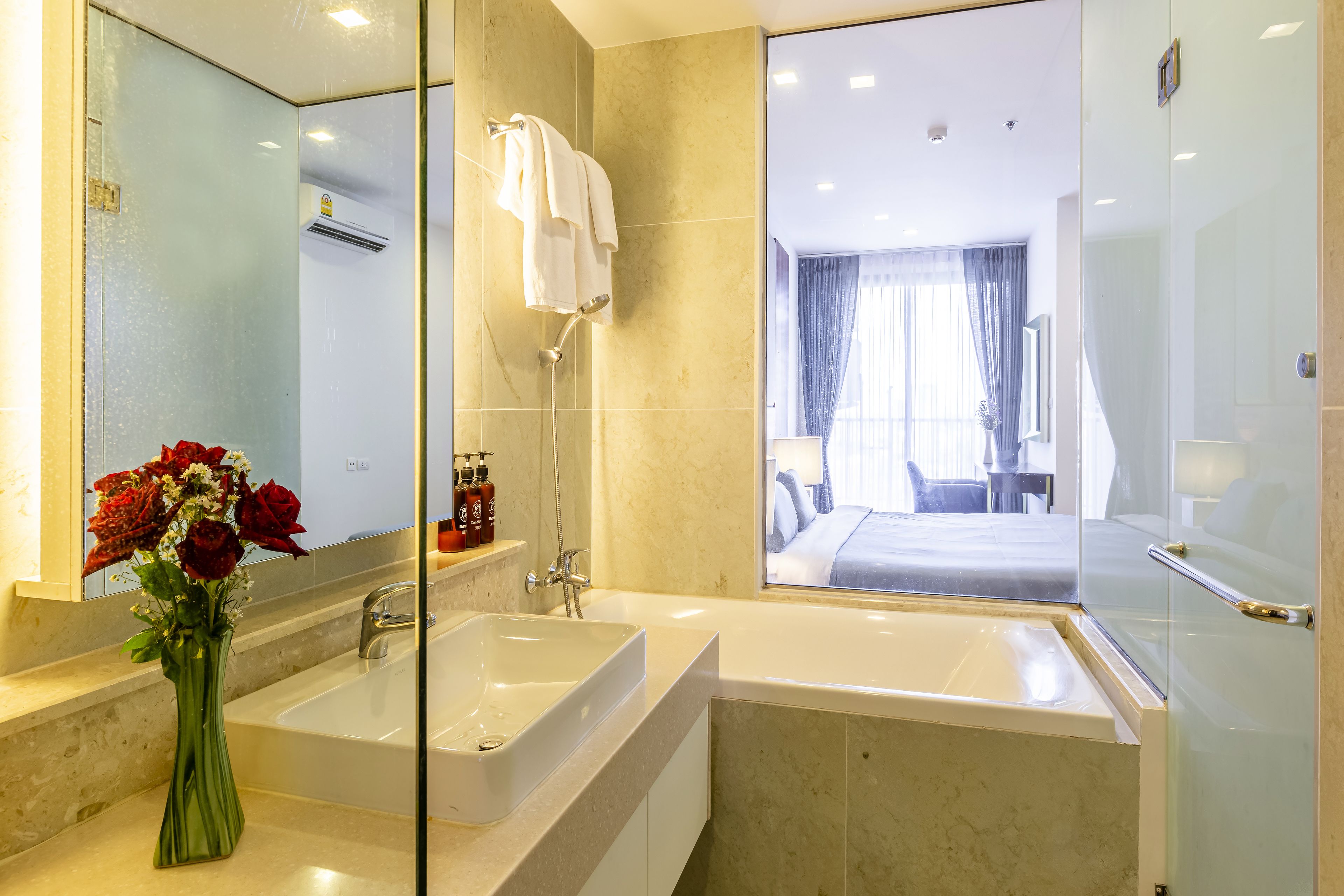 suite, 1 bedroom, city view, garden area | bathroom | free toiletries, hair dryer, towels, shampoo