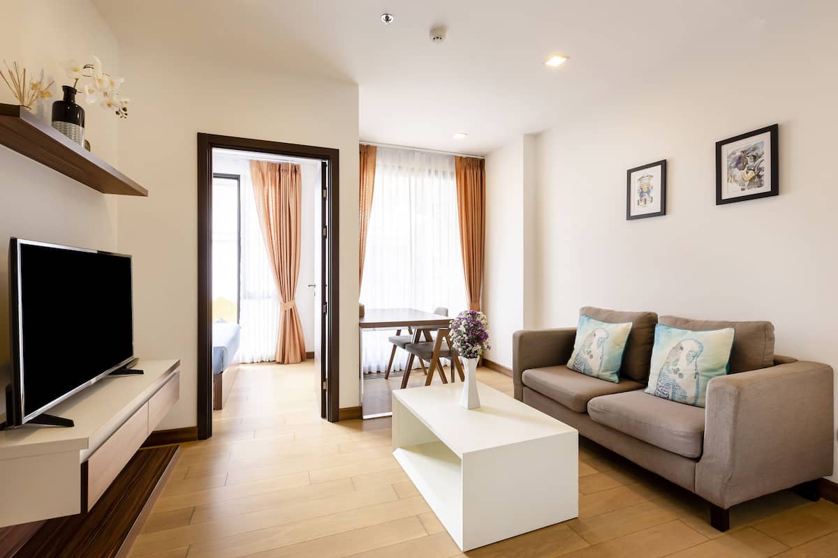 Suite, 1 Bedroom, City View | Living area | Flat-screen TV