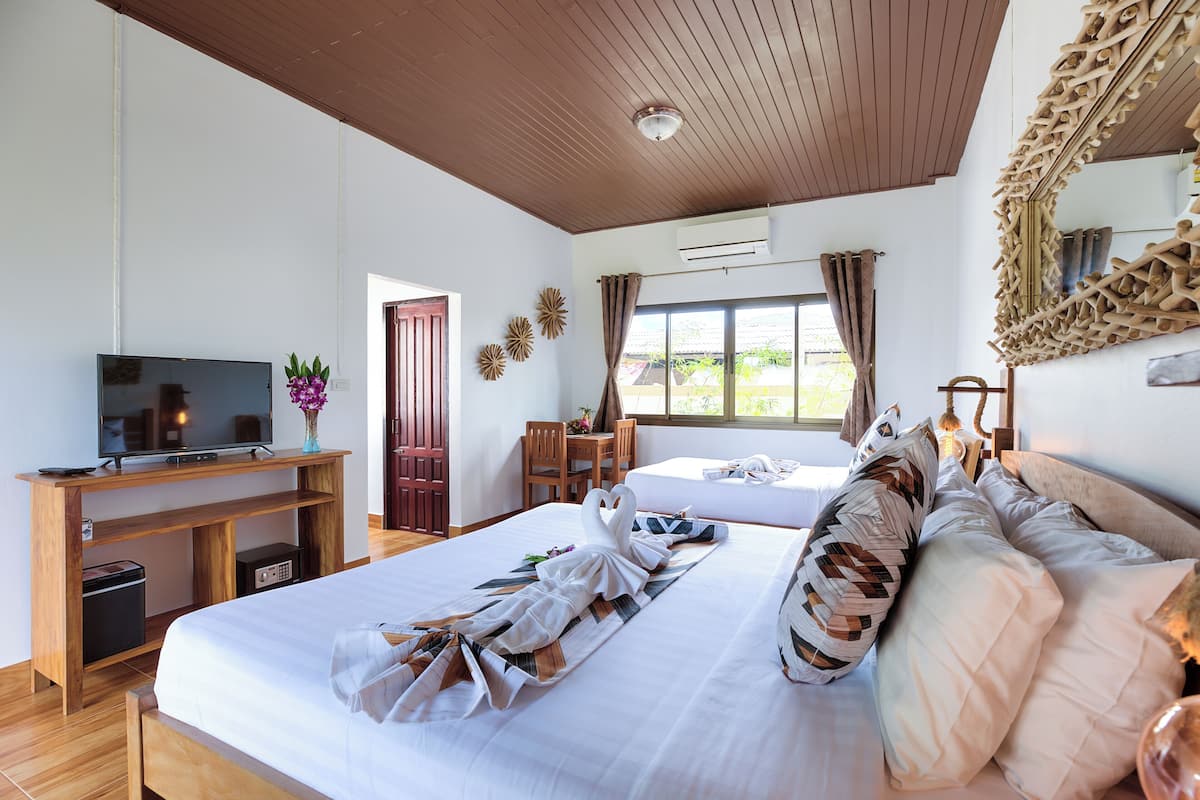 Camera Deluxe, 1 letto king, angolo cottura, vista resort | 1 camera, biancheria da letto di alta qualità