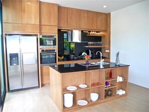 Apartment, 3 Bedrooms | Private kitchen | Fridge, microwave, oven, stovetop