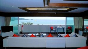 Apartment, 1 Bedroom, Sea View | Living area | Flat-screen TV, DVD player