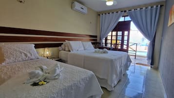 Deluxe Suite, 2 Bedrooms, Pool Access | Minibar, desk, free cribs/infant beds, rollaway beds