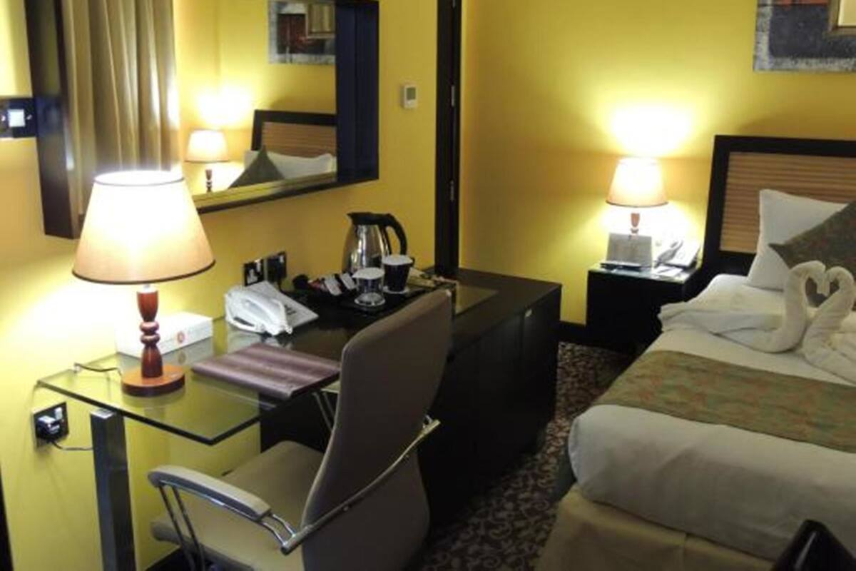 Single Room | Minibar, in-room safe, blackout drapes, iron/ironing board (on request)