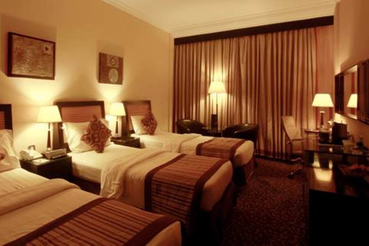 Triple Room | Minibar, in-room safe, blackout drapes, iron/ironing board (on request)