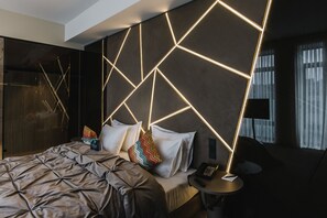 Ropa de cama de alta calidad y minibar 