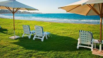 Private beach, sun-loungers, beach umbrellas, beach towels