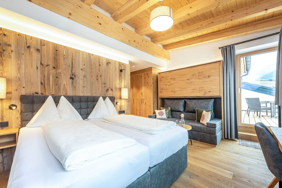 Luxe beddengoed, een kluis op de kamer, individueel gemeubileerd