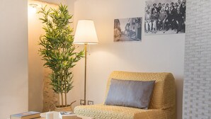 Family Studio (Casa Siciliana 7) | Living area | Flat-screen TV