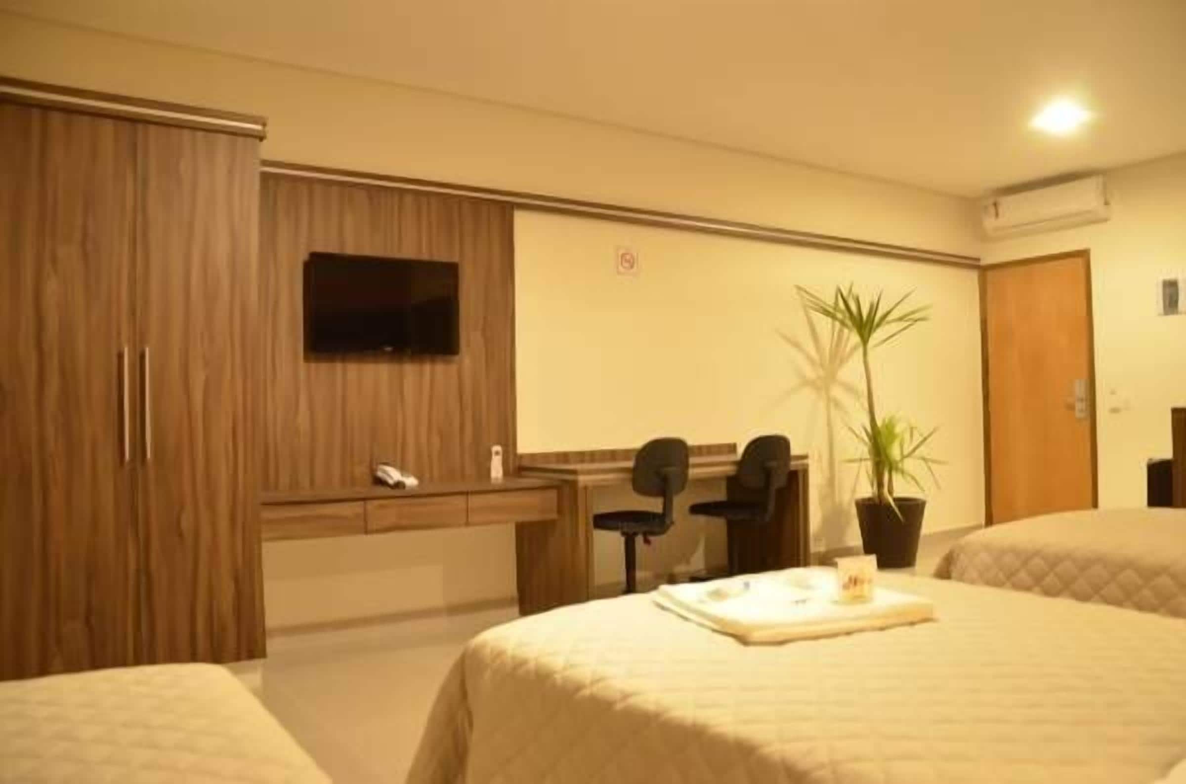 business triple room | minibar, in-room safe, desk, blackout curtains