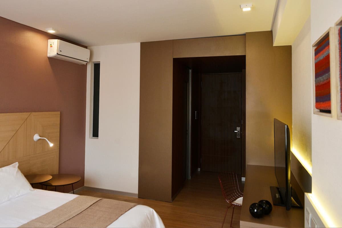 Premium bedding, down comforters, pillowtop beds, minibar
