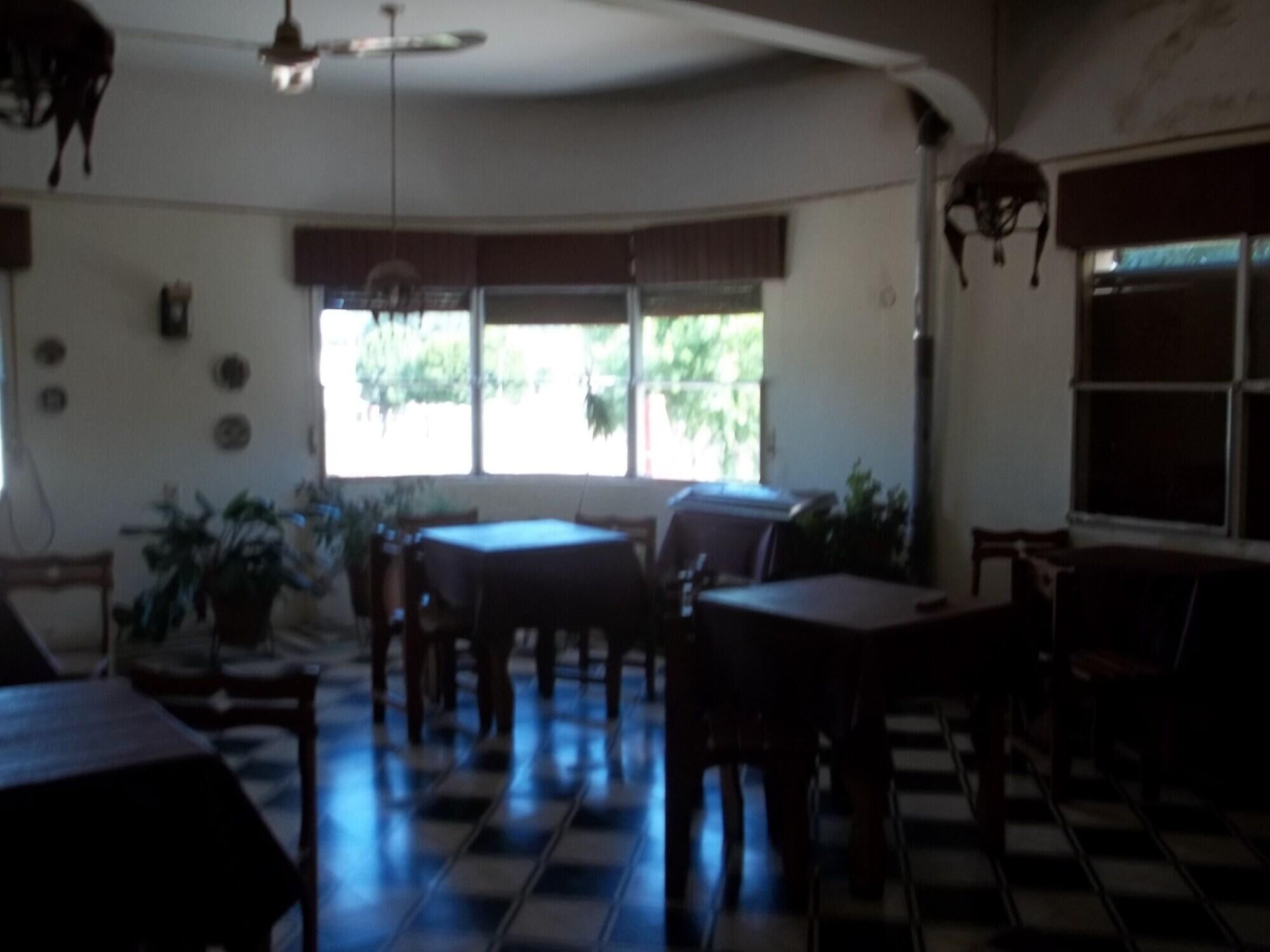 Breakfast, lunch, dinner served; Argentinean cuisine, pool views 