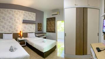 Blackout drapes, free WiFi, bed sheets