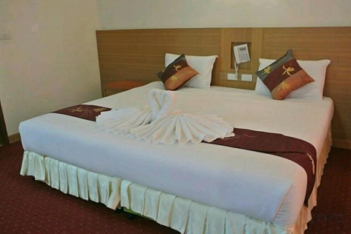 Desk, blackout drapes, rollaway beds (surcharge), WiFi (free)