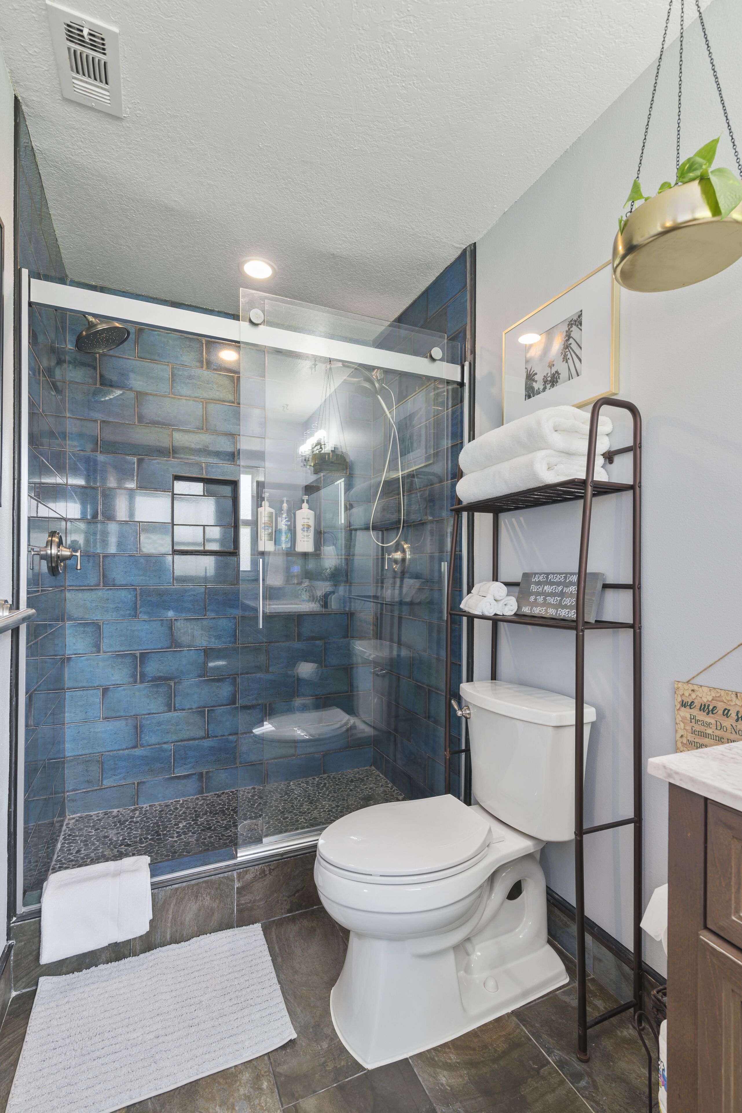 Combined shower/tub, hair dryer, towels, soap