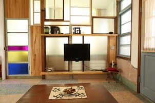 Habitación cuádruple familiar | Zona de estar