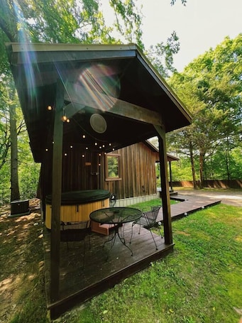 Terrace/patio. Spring Hill Cozy Retreat | Private Hot Tub for Two