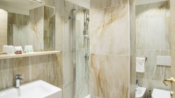 Free toiletries, hair dryer, bidet, towels