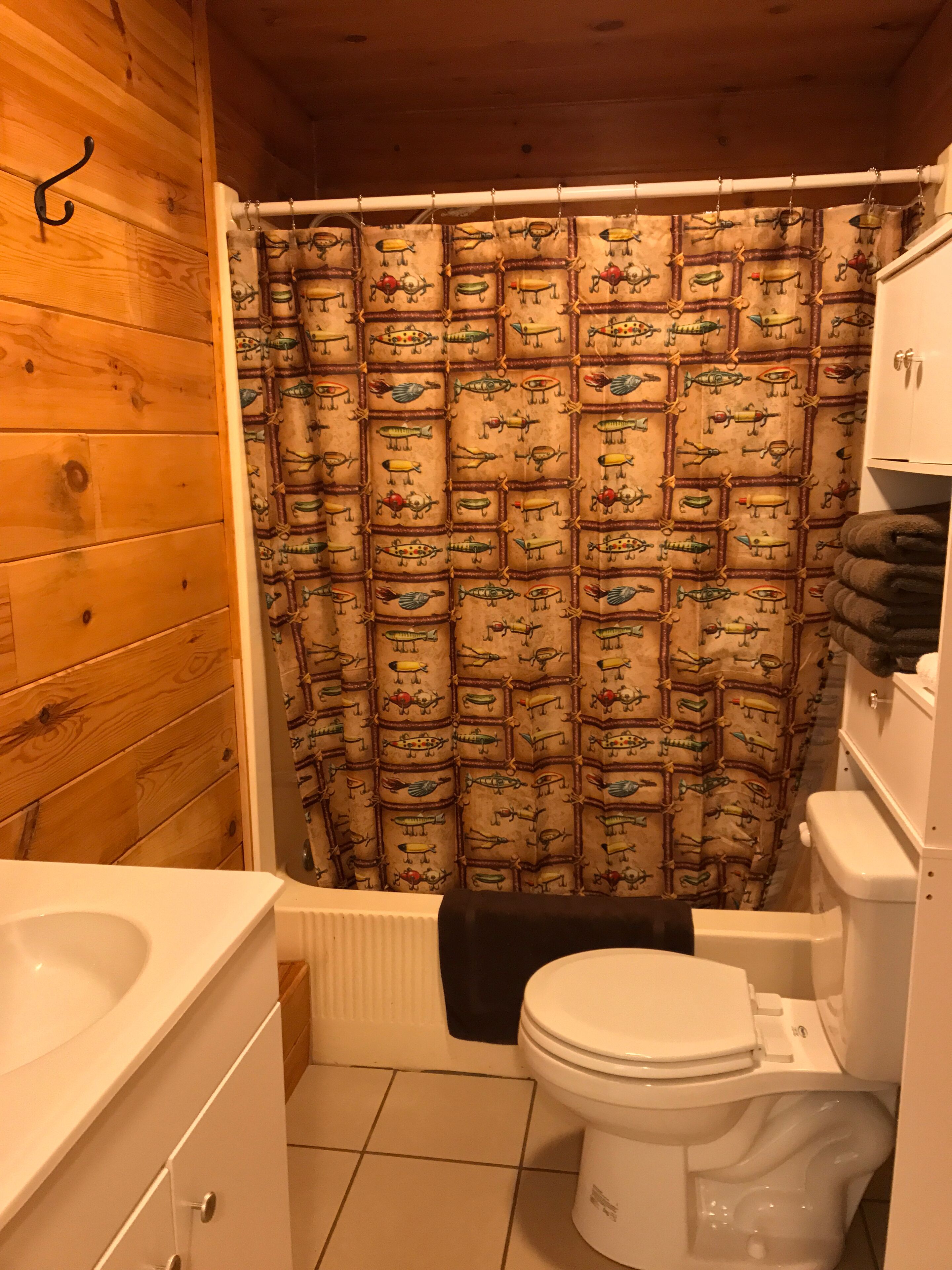 Bathtub, hair dryer, towels, soap