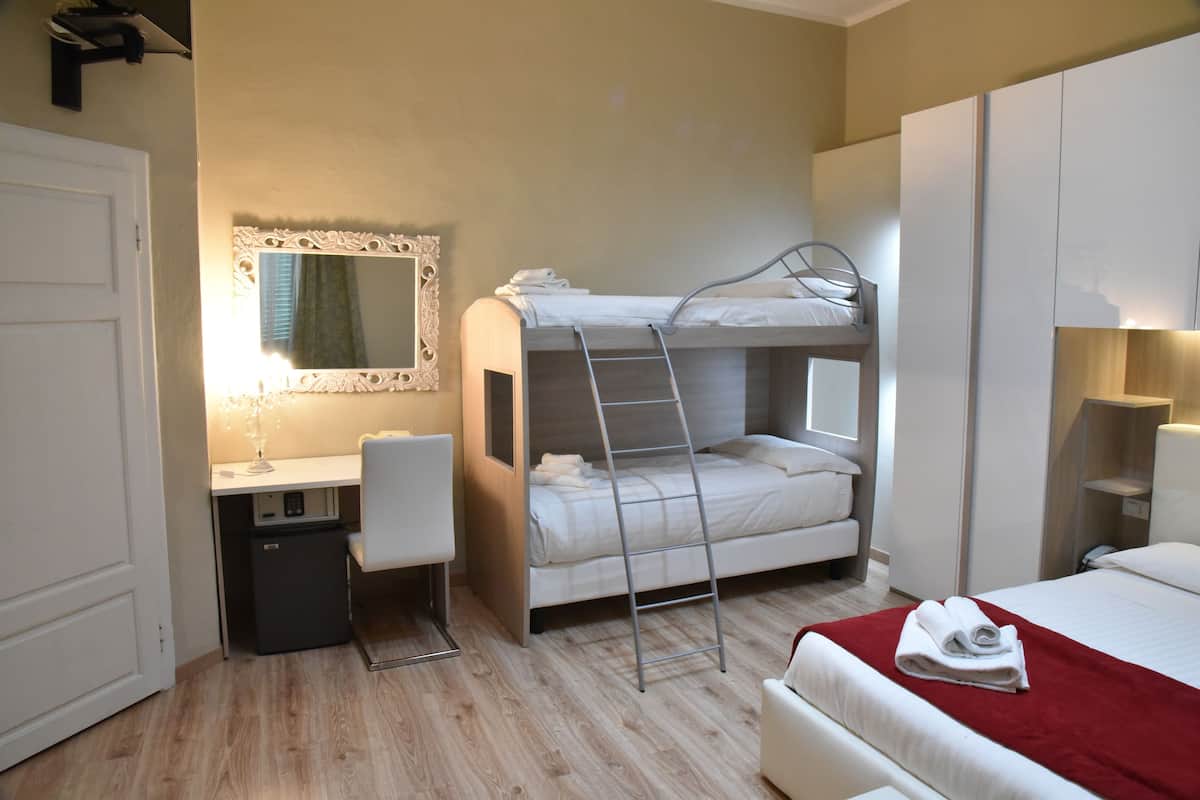 Quadruple Room | Minibar, in-room safe, desk, free WiFi