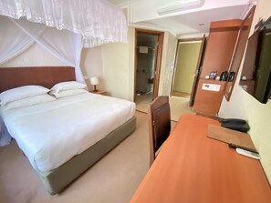 In-room safe, desk, laptop workspace, soundproofing - Sangana Lodge (Moshi)