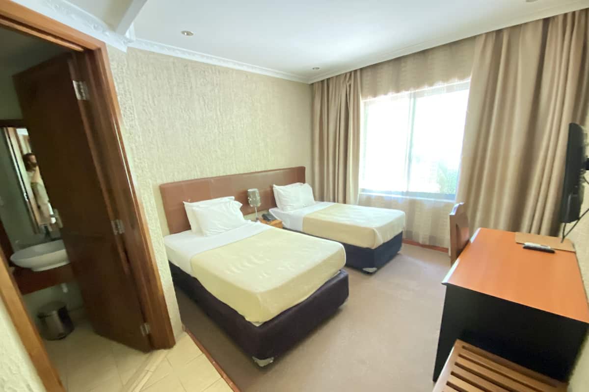 Deluxe Twin Room, 2 Twin Beds | In-room safe, desk, laptop workspace, soundproofing