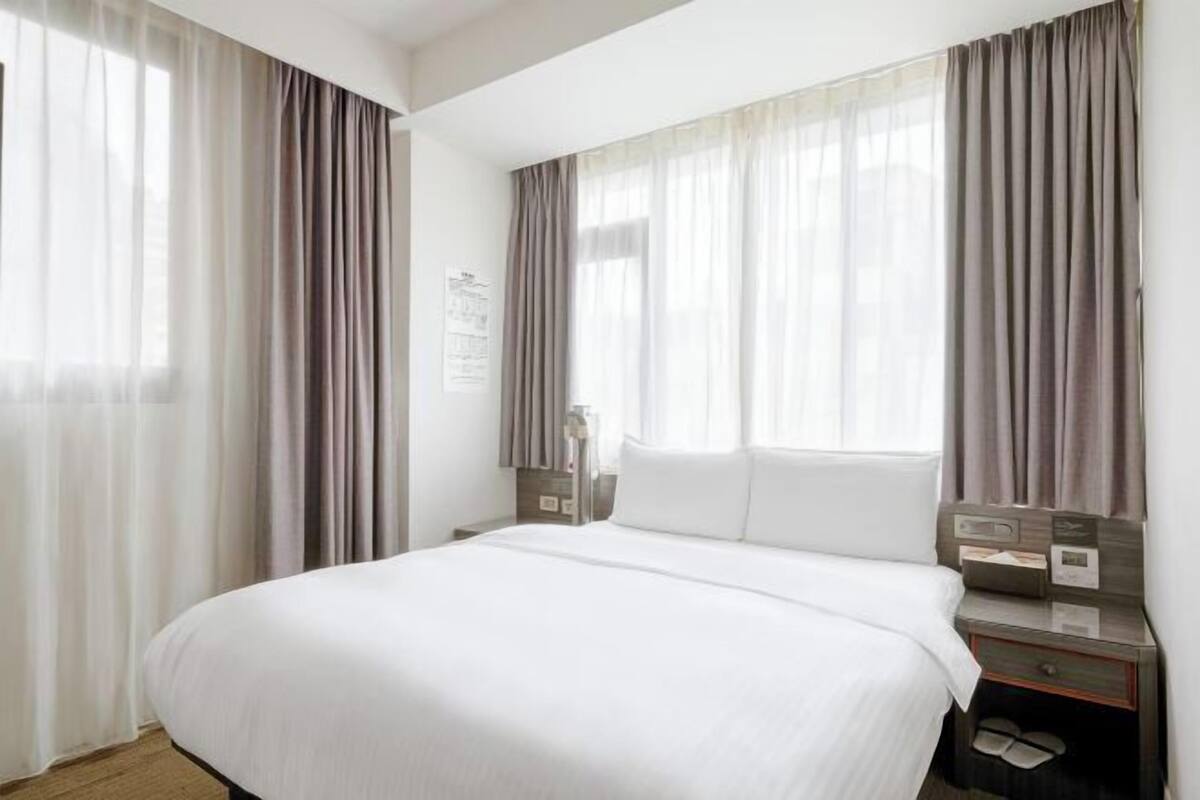Premium bedding, desk, laptop workspace, bed sheets