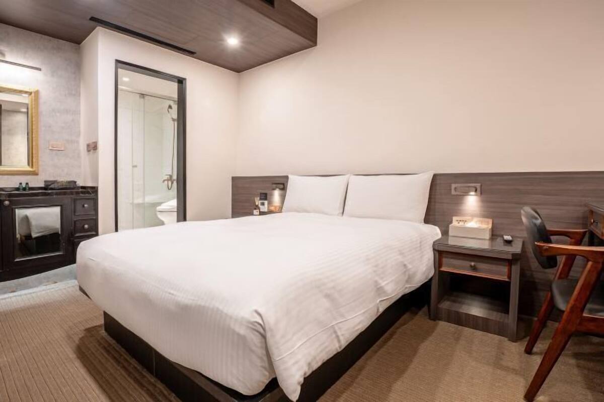 Premium bedding, desk, laptop workspace, bed sheets