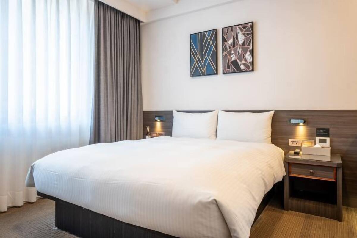 Premium bedding, desk, laptop workspace, bed sheets
