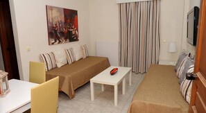 อพาร์ทเมนท์, 1 ห้องนอน (4 Adults) | บริเวณนั่งเล่น | ทีวีจอแบน