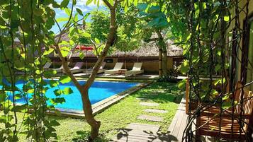 Outdoor pool, pool umbrellas, pool loungers