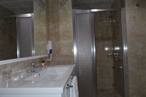 Shower, free toiletries, hair dryer, bathrobes