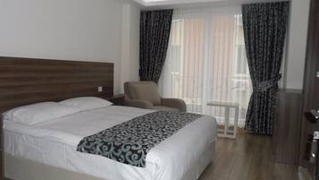 Roupas de cama premium, frigobar, quartos à prova de som