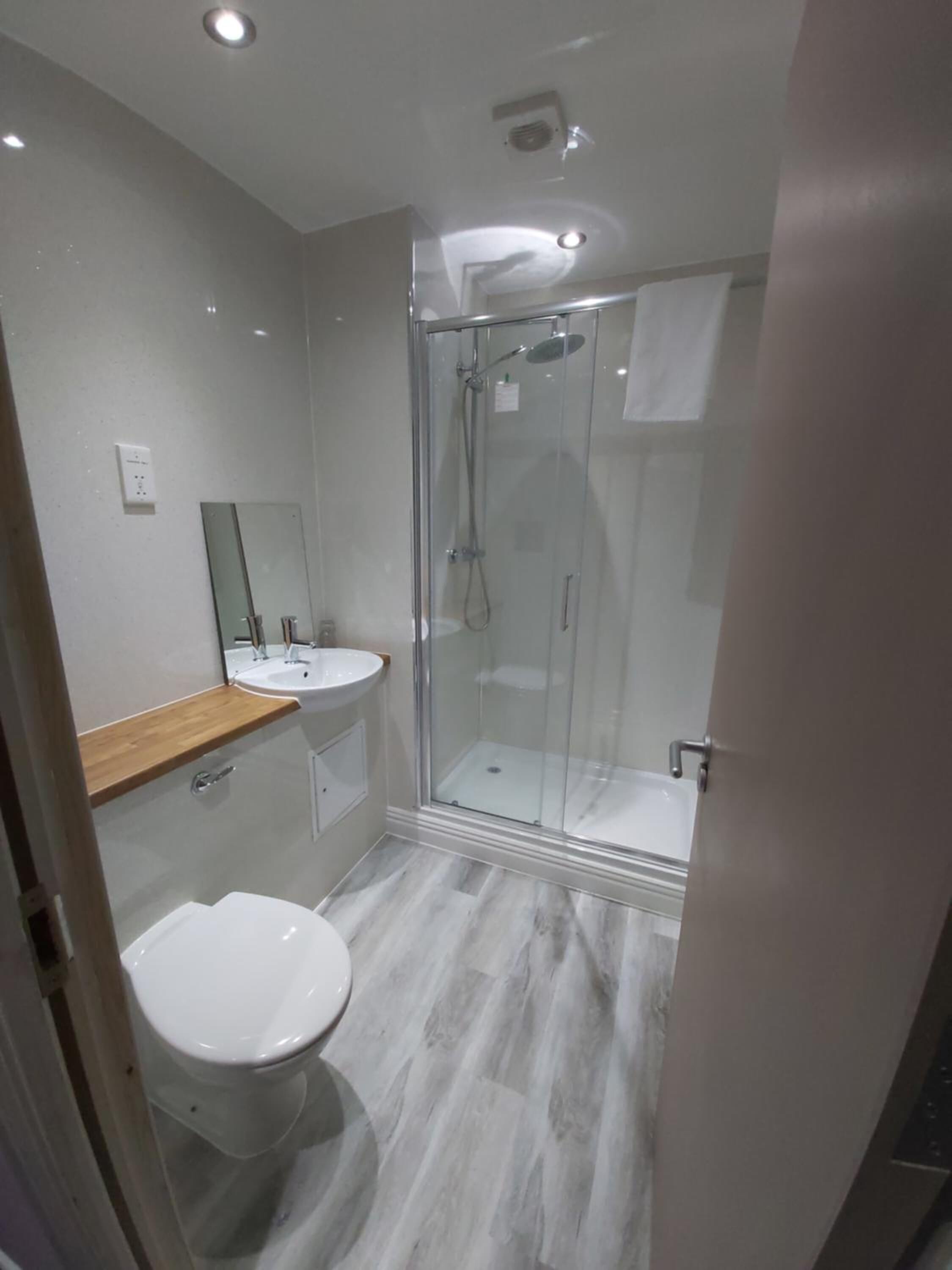 Shower, free toiletries, hair dryer, towels